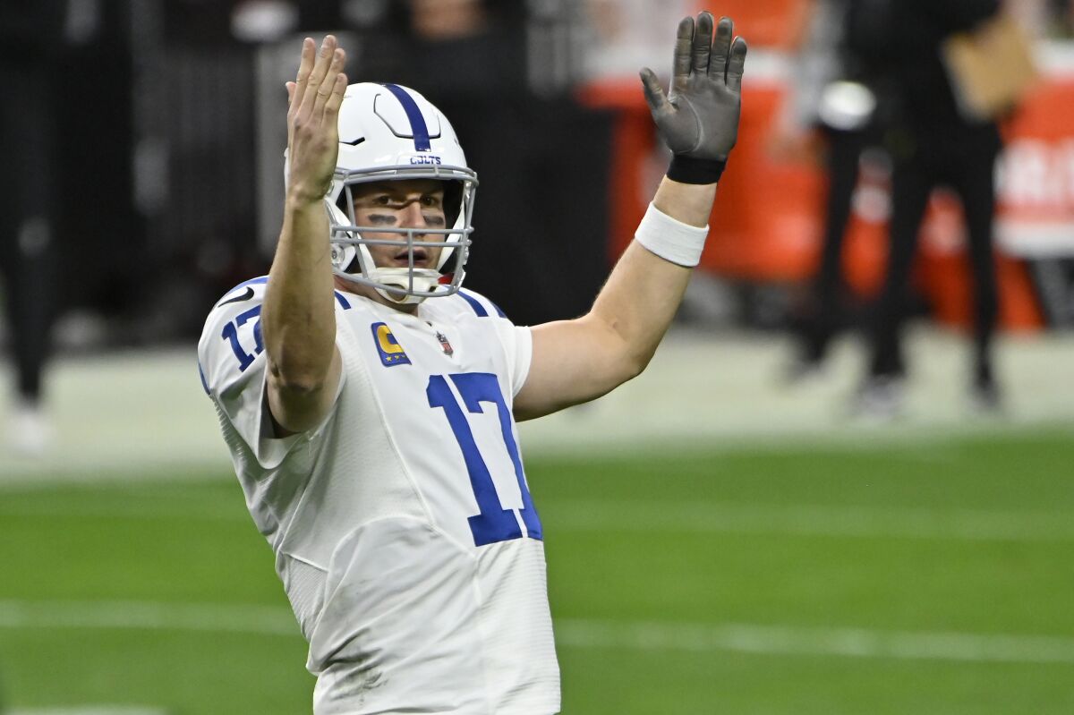Indianapolis Colts quarterback Philip Rivers (17) celebrates touchdown against Las Vegas Raiders during second half Sunday.