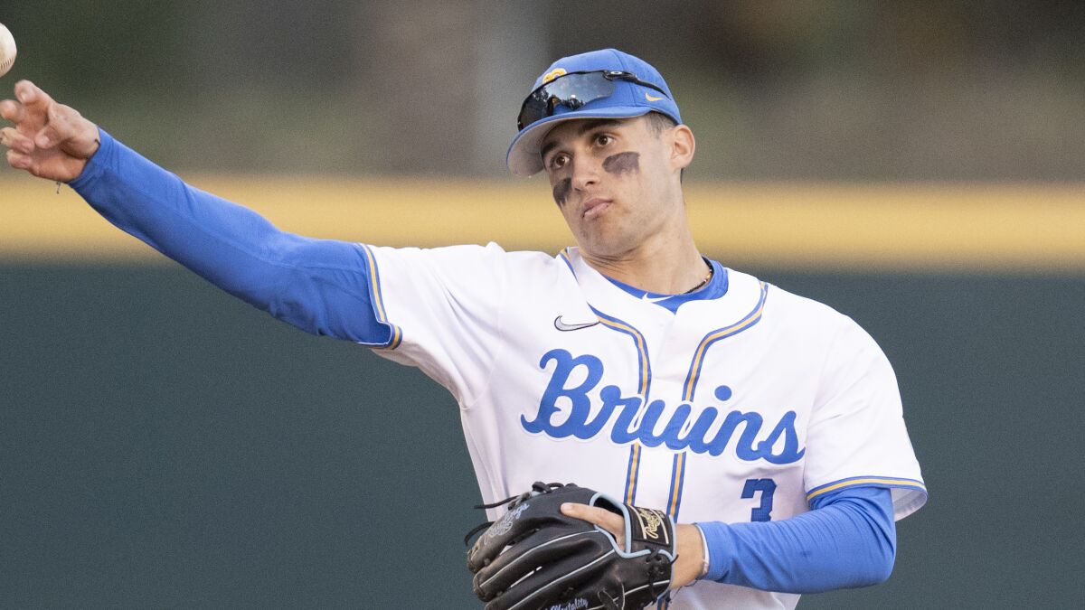UCLA second baseman Ethan Gourson throws a ball during a game against UC Santa Barbara.