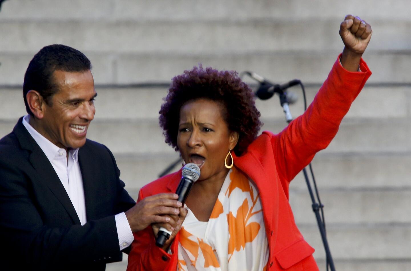 Comedian Wanda Sykes, right, performs alongside Mayor Antonio Villaraigosa during the Celebrate LA! Block Party at downtown's Grand Park. The boisterous bash was mostly about celebrating Villaraigosa's two terms as mayor.