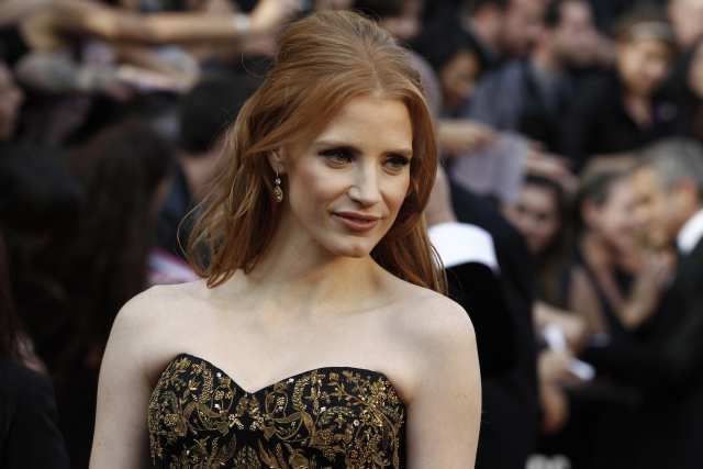 Jessica Chastain still felt like the new girl in town as she made her way down the red carpet. "It's incredible. It's something that I always dreamed about. It actually means that I'm doing it," she said, taking in her surroundings. "I've wanted to be an actor and now it's like, 'I'm at the Oscars. This is great.' I'm with my grandma and that calms me down a bit."