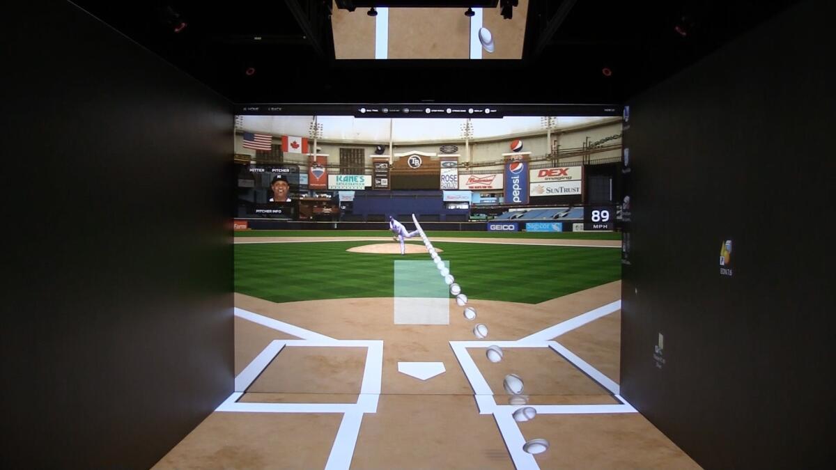 A pitch is delivered on the virtual reality simulator that is being used by teams in the majors.