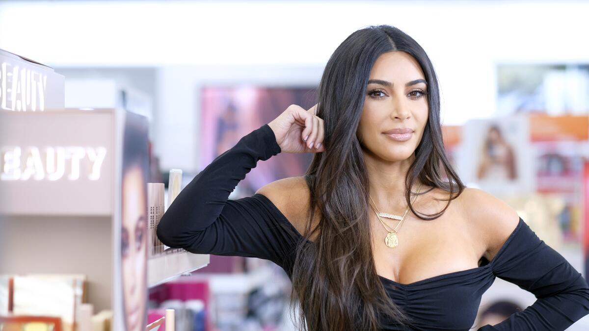 Kim and Kourtney Kardashian leave their new NY boutique DASH. The