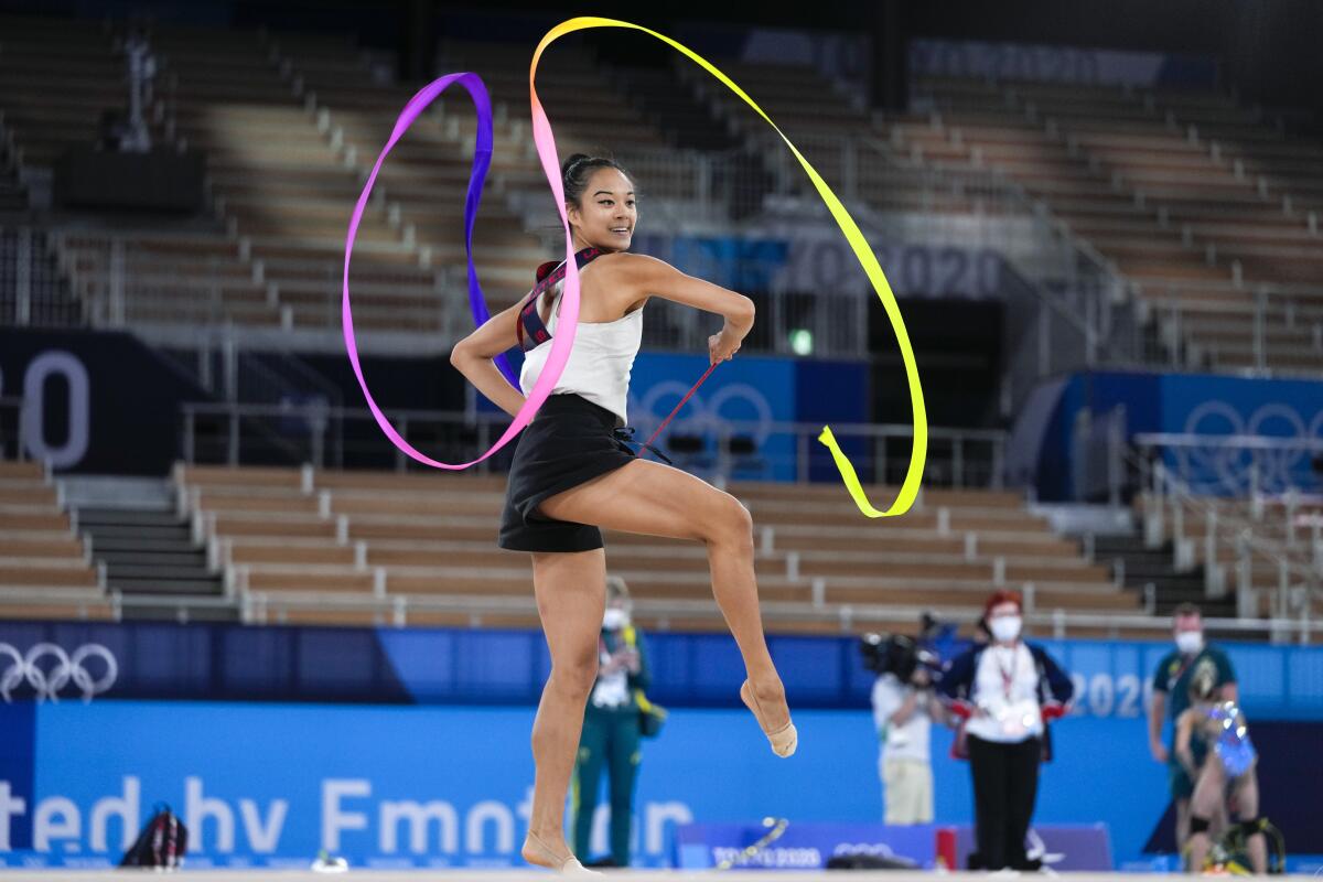 Laura Zeng of the United States performs during a rhythmic gymnastics individual training session at the 2020 Summer Olympics, Thursday, Aug. 5, 2021, in Tokyo, Japan. (AP Photo/Markus Schreiber)
