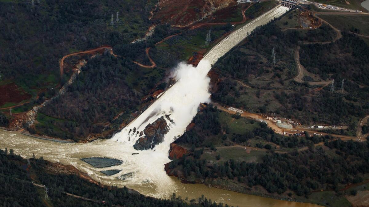 An aerial view of the water flowing out of the Oroville Dam main spillway in February 2017.