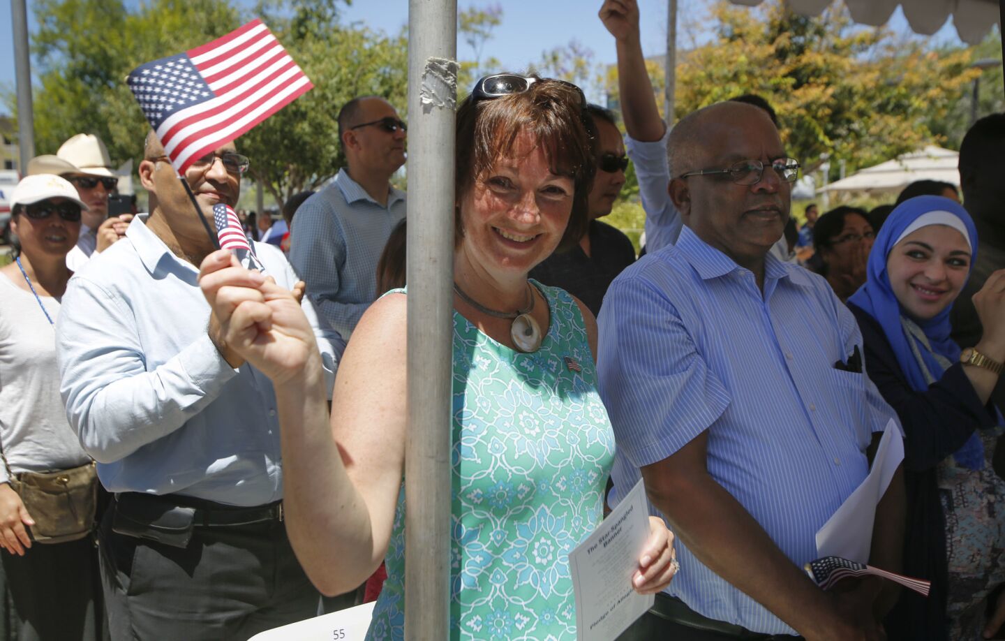Jean Dustan, originally from the United Kingdom was one of about 100 people from about 54 countries who took the Oath of Allegiance to the United States of America and became U.S. citizens during a naturalization ceremony held in Centennial Plaza near El Cajon City Hall to kickoff El Cajon's, America on Main Street festivities.