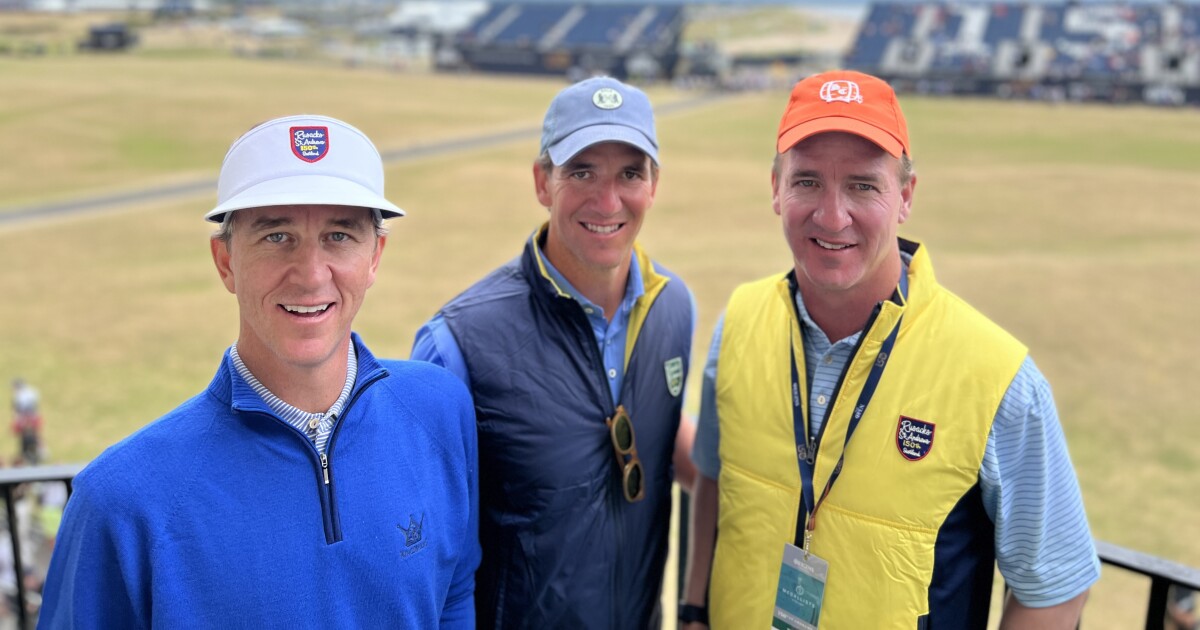 Manning brothers enjoy British Open from balcony overlooking 18th hole