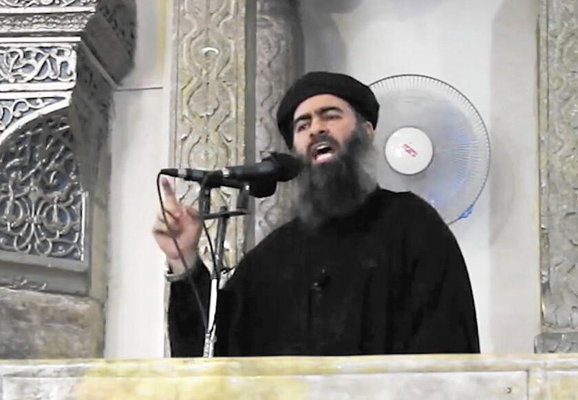 Abu Bakr Baghdadi speaks at a mosque in Mosul, Iraq, in an image from a video posted on a militant website on July 5.
