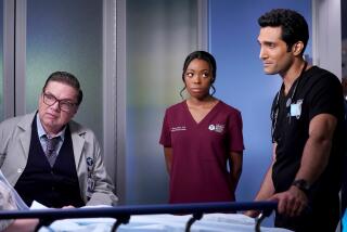 Oliver Platt, left, Asjha Cooper and Dominic Rains in "Chicago Med" on NBC.
