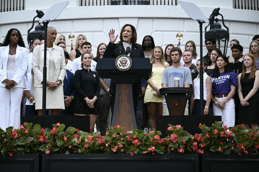 US Vice President Kamala Harris speaks during an event honoring National Collegiate Athletic Association (NCAA) championship teams from the 2023-2024 season, on the South Lawn of the White House in Washington, DC on July 22, 2024. Joe Biden on July 21, 2024 dropped out of the US presidential election and endorsed Vice President Kamala Harris as the Democratic Party's new nominee, in a stunning move that upends an already extraordinary 2024 race for the White House. Biden, 81, said he was acting in the "best interest of my party and the country" by bowing to weeks of pressure after a disastrous June debate against Donald Trump stoked worries about his age and mental fitness. (Photo by Brendan SMIALOWSKI / AFP) (Photo by BRENDAN SMIALOWSKI/AFP via Getty Images)