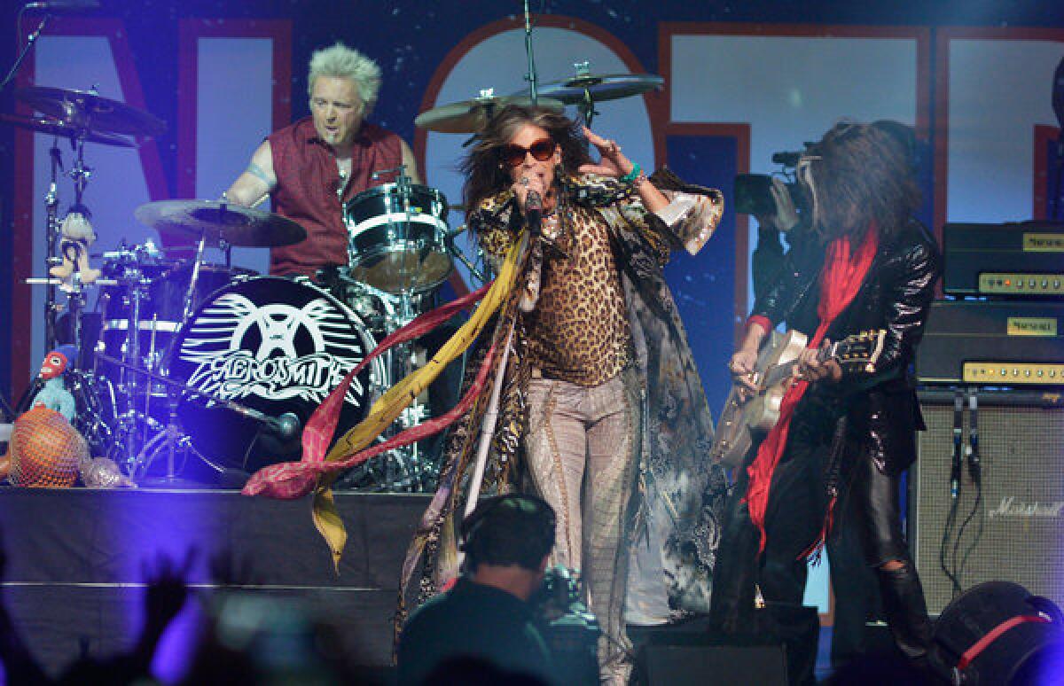 Steven Tyler and Aerosmith perform during the Boston Strong concert Thursday night at TD Garden.