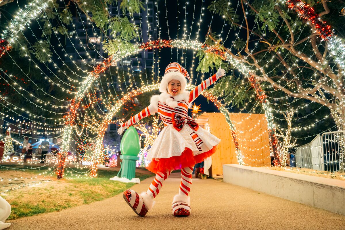 A holiday character celebrates the season at the Holiday Market at Petco Park.