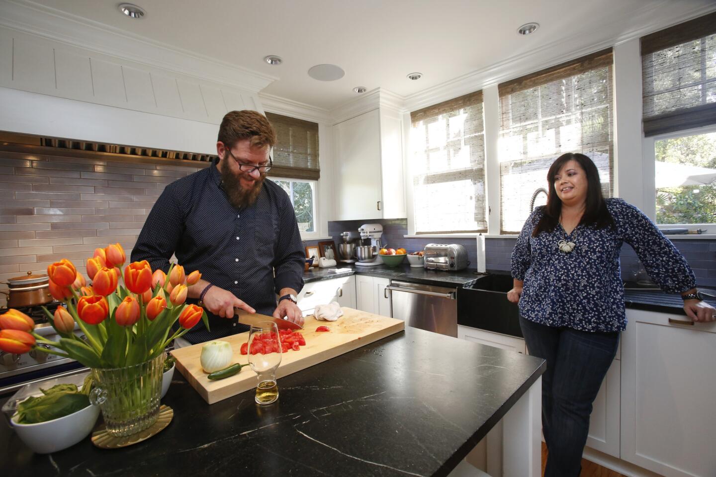 As his pastry chef wife, Crisi Echiverri, watches, Providence chef Michael Cimarusti prepares an after-school pasta dish for their kids in their 1912 South Pasadena home.