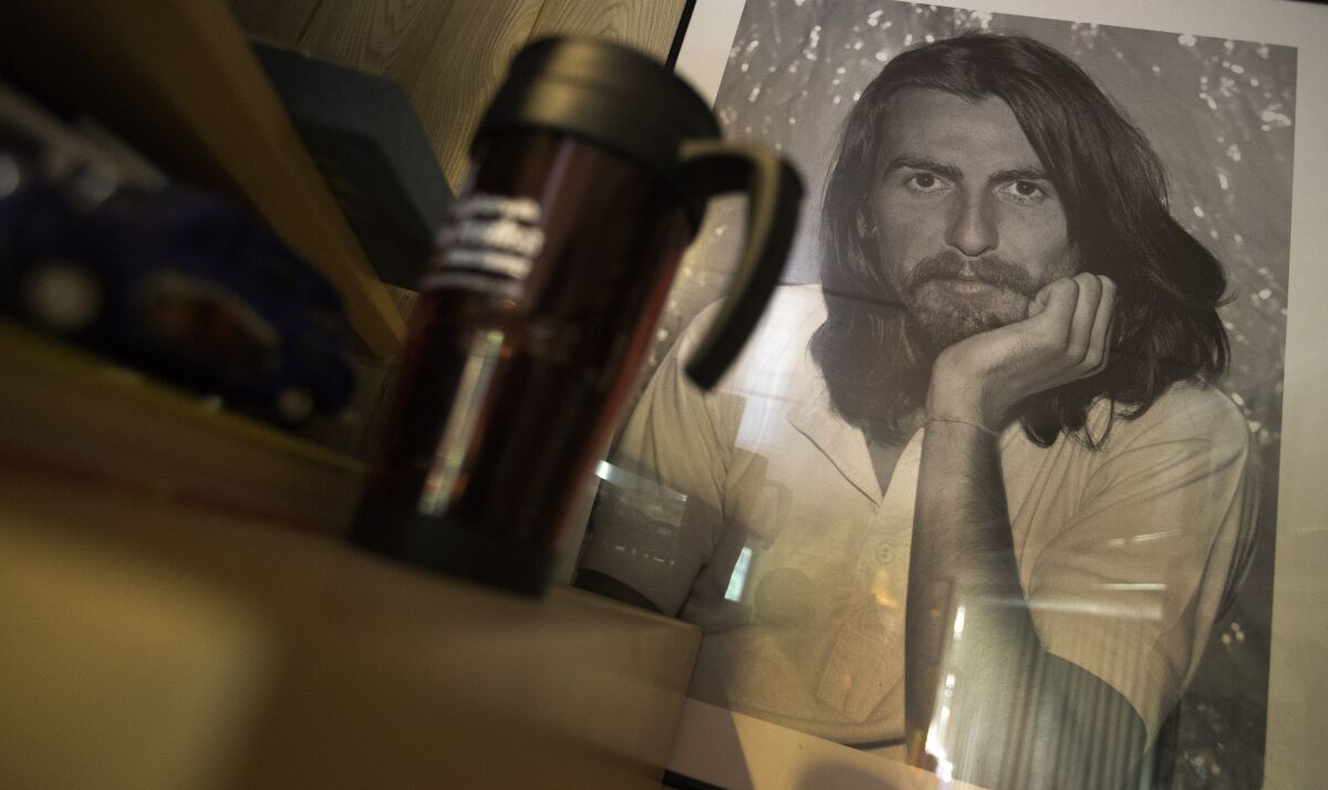 SHERMAN OAKS, CALIF. -- WEDNESDAY, OCTOBER 21, 2015: A portrait of George Harrison in a corner of Chris Carter's garage studio in Sherman Oaks, Calif., on Oct. 21, 2015. This year marks the 45th anniversary of the release of Harrison's landmark solo album "All Things Must Pass." (Brian van der Brug / Los Angeles Times)