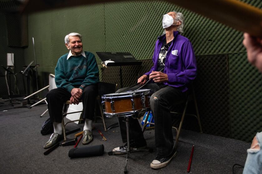  Jazz drummer Steve Hideg, 91, left, Doors' drummer John Densmore, middle, and guitarist Leo Vaz in Los Angeles.