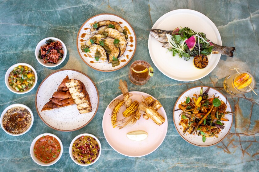 A selection of entrees and side dishes from the new San Juan Capistrano restaurant, Mayfield.