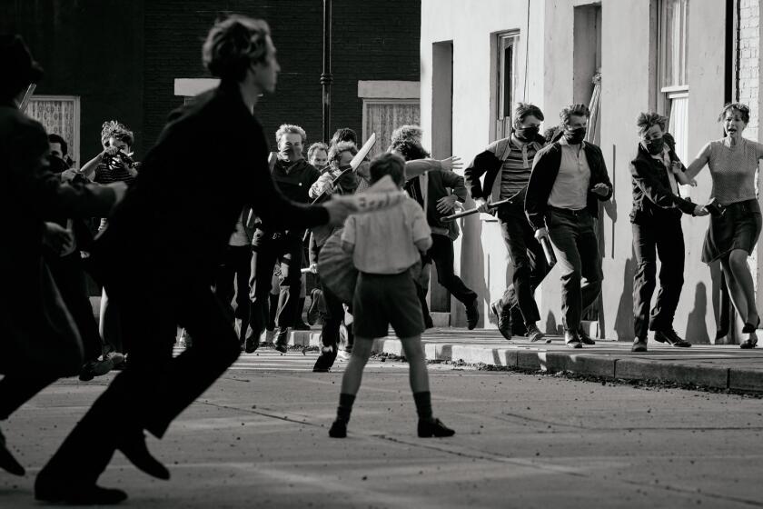 "Belfast "- One Shot : In Kenneth Branagh's personal novella "Belfast," an emotional narrative propels us into the Northern Ireland conflict through the eyes of a boy named Buddy (Jude Hill) where riots have taken over his once peaceful neighborhood. Through the chaos, cinematographer Haris Zambarloukos unconventionally tells the story composing an immersive frame that continually circles Buddy with one-shot action that's uncut and unedited. Caitriona Balfe stars as "Ma" at right. "This scene is the critical mass point for Buddy's life, the transformative moment of his existence," says Zambarloukos. "It was Ken's changing point in real life and the reason for making this film. Ken always described this moment as his world turning inside out. I had a similar experience when I was four and Turkey invaded Cyprus, I had to live with military presence in close proximity to me ever since. I was never the same."