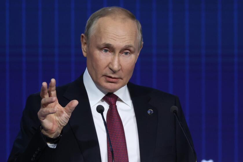 Russian President Vladimir Putin gestures while speaking at the plenary session of the 19th annual meeting of the Valdai International Discussion Club outside Moscow, Russia, Thursday, Oct. 27, 2022. (Sergei Karpukhin, Sputnik, Kremlin Pool Photo via AP)