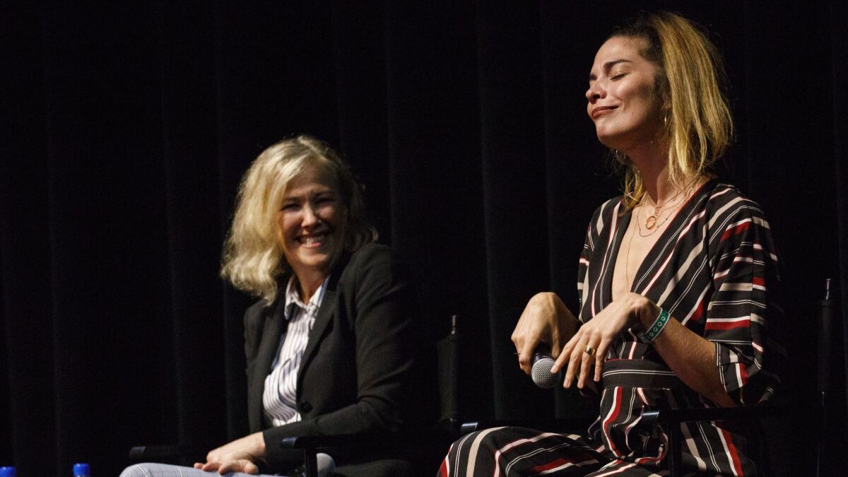 Annie Murphy flips her wrists for character Alexis Rose as Catherine O'Hara watches during "Schitt's Creek; Up Close & Personal" at the Theatre at Ace Hotel on Sunday.