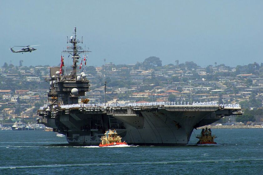 KITTYHAWK1. jpg SAN DIEGO (Aug. 7, 2008) The aircraft carrier USS Kitty Hawk (CV 63) prepares to moor at Naval Air Station North Island upon her return to San Diego Thursday, Aug. 7, 2008. Kitty Hawk will be decommissioned next year in Bremerton, Wash. The 46- year-old carrier is the oldest active-duty warship in the Navy and will be replaced this summer by the nuclear-powered aircraft carrier USS George Washington (CVN 73) as the Navy's only permanently forward-deployed aircraft carrier. U.S. Navy photo by Mass Communication Specialist 3rd Class John Wagner (Released)