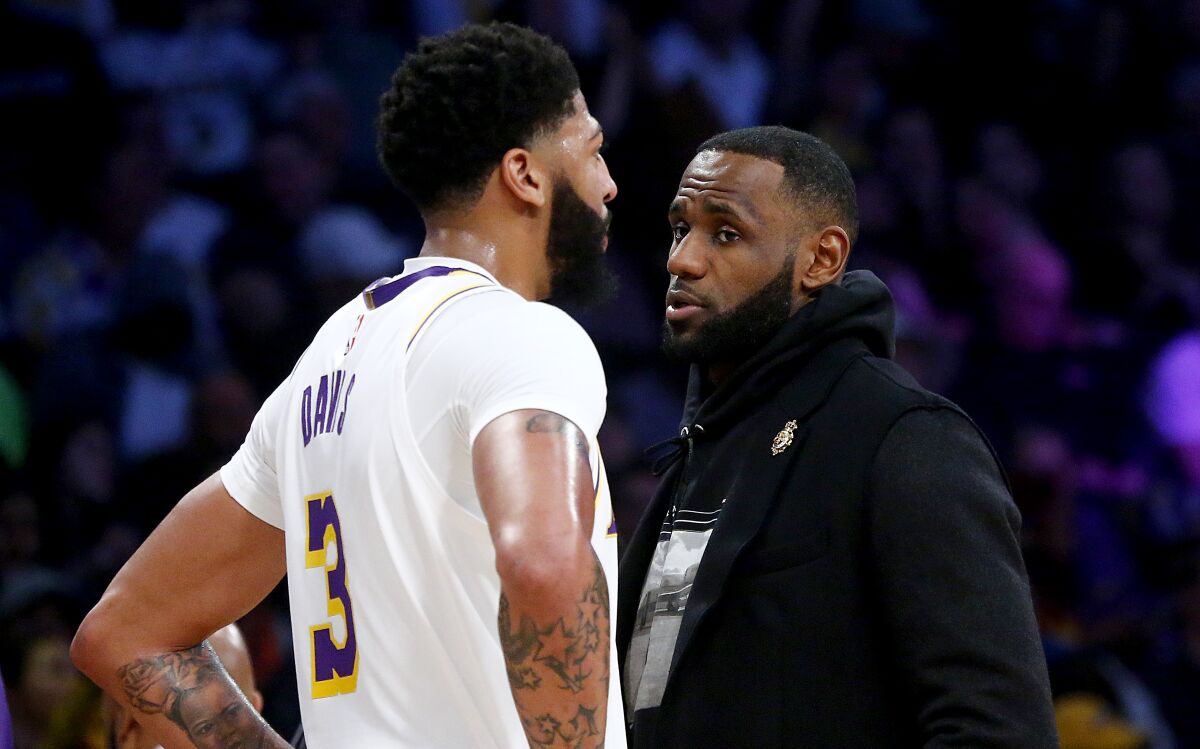 Lakers stars Anthony Davis and LeBron James talk.