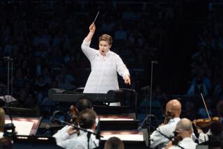 LOS ANGELES, CA - AUGUST 30: Icelandic conductor Eva Ollikainen conducts the Los Angeles Philharmonic at the Hollywood Bowl on Tuesday, Aug. 30, 2022 in Los Angeles, CA. (Jason Armond / Los Angeles Times)