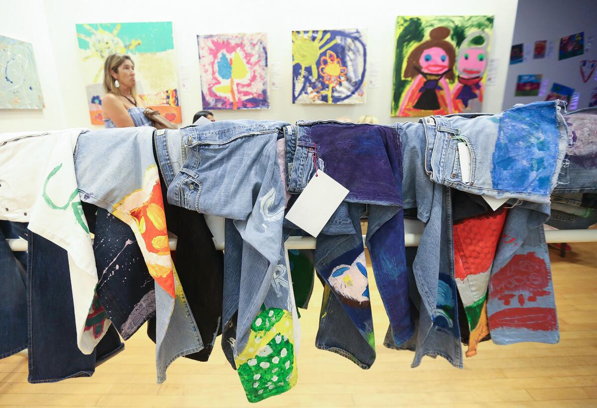 An example of the artwork by 16-year-old Clara Woods, including designs on denim.