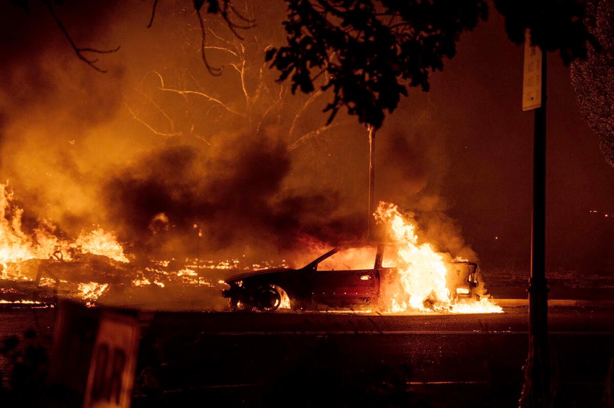 Fires rage in the central Oregon town of Talent, near Medford, late Tuesday.