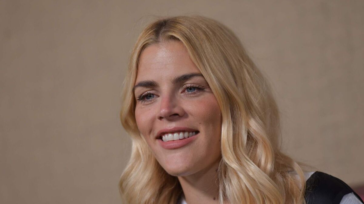 After a decade in Hollywood starring on series like "Dawson's Creek," "Freaks and Geeks" and "Cougar Town," Busy Philipps will debut her new late-night talk show "Busy Tonight" Sunday on E!