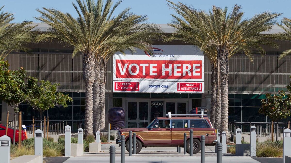 In October 2016, on the first day of voting in San Diego County, several people came to the Registrar of Voters office in Kearny Mesa to cast their ballots. A new state law has added to the office's challenges.