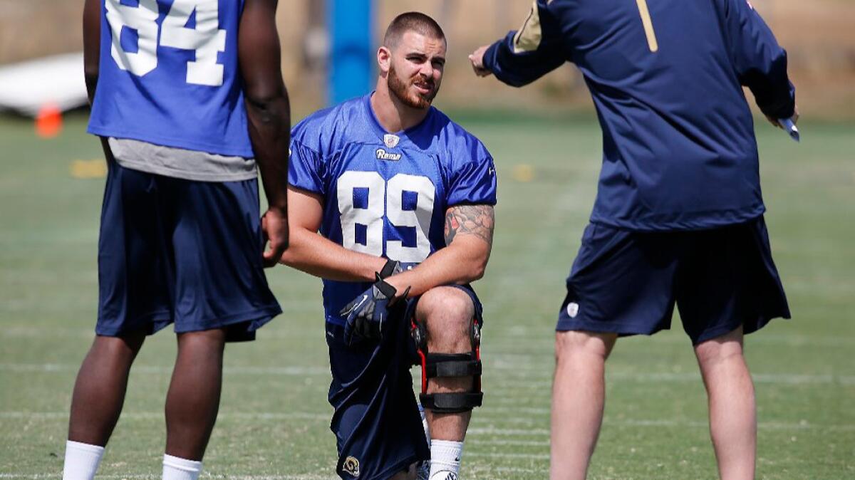 Tyler Higbee listens to instructions during a Rams rookie mini-camp practice on May 7.