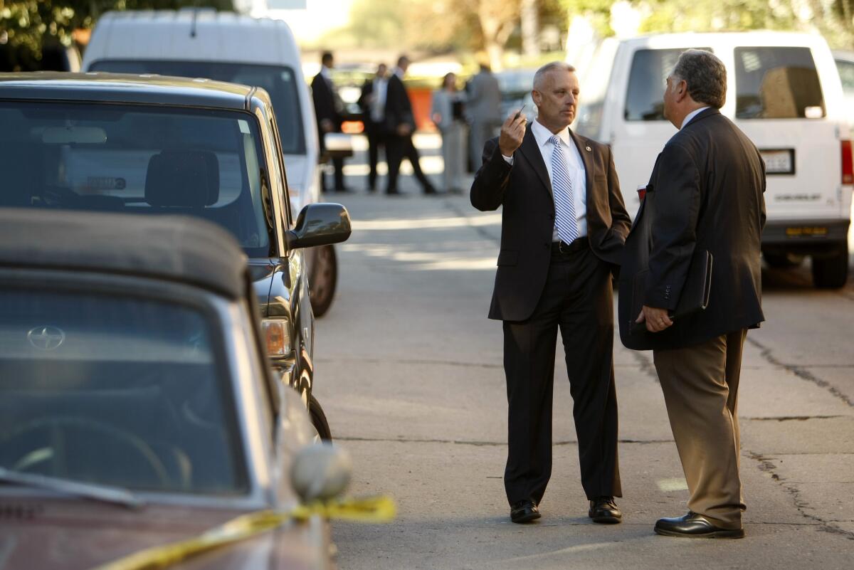 Investigators were scouring a Silver Lake neighborhood where Joseph Gatto, 78, the father of Assemblyman Mike Gatto, was found fatally shot his home.