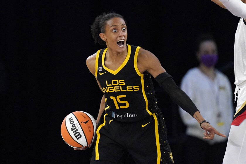 Los Angeles Sparks guard Brittney Sykes reacts after committing a shot clock violation during the second half of a WNBA basketball game against the Las Vegas Aces Friday, July 2, 2021, in Los Angeles. The Aces won 66-58. (AP Photo/Mark J. Terrill)