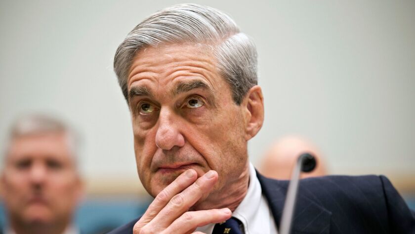 Then-FBI Director Robert Mueller testifies on Capitol Hill in Washington on June 13, 2013.