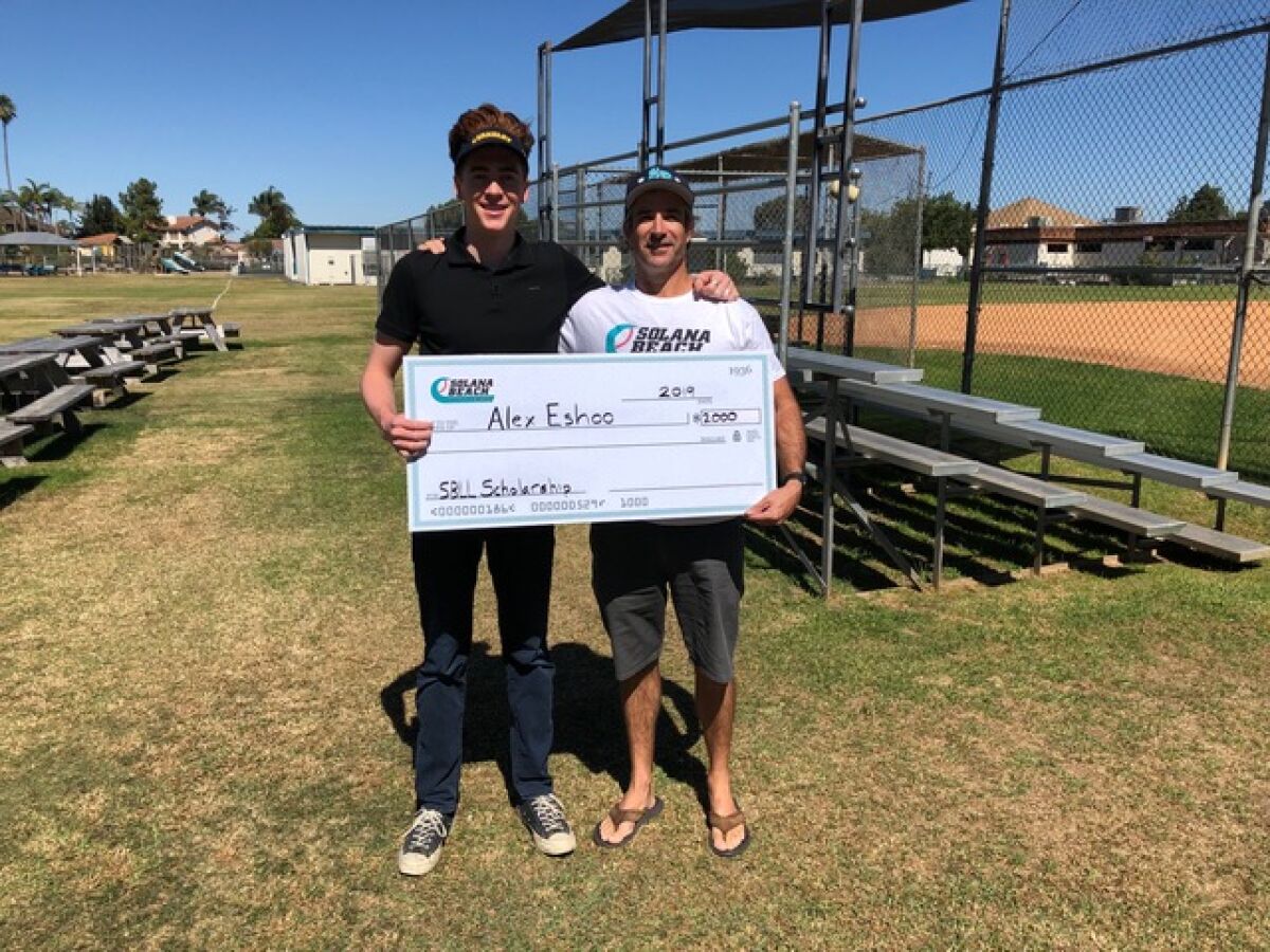Alex Eshoo, the $2,000 scholarship recipient pictured with SBLL President Patrick Johnson.