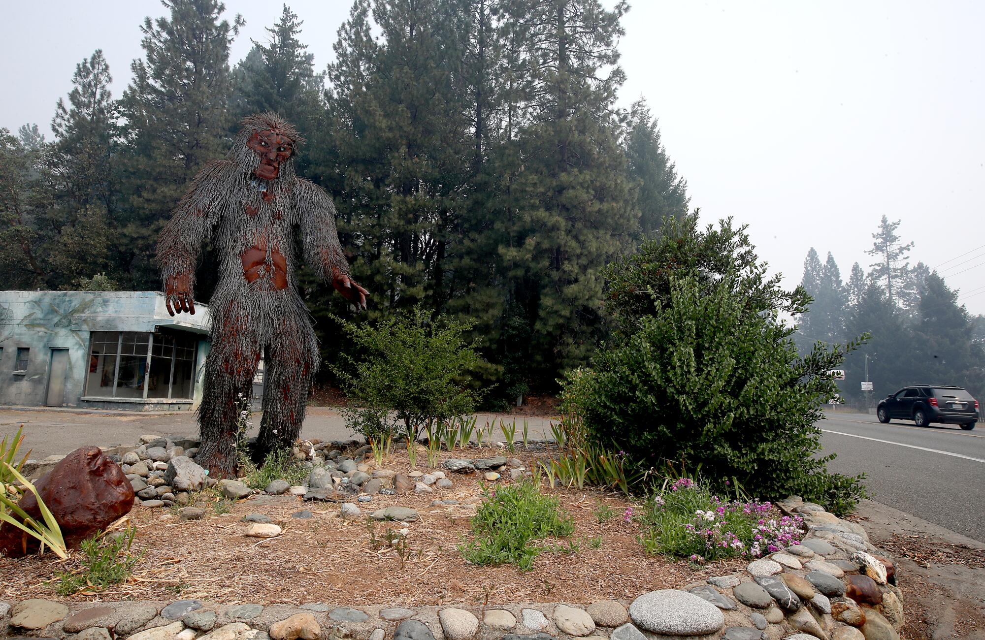 A metal sculpture of Bigfoot welcomes visitors to the tiny community of Happy Camp in the Klamath Forest. 