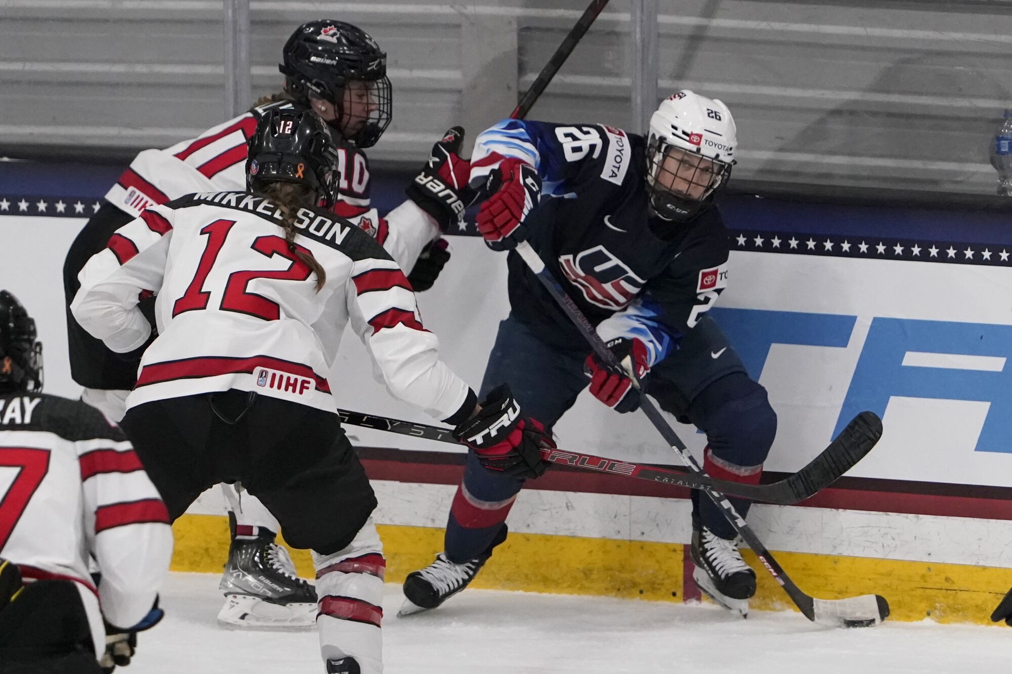 U.S. forward Kendall Coyne Schofield, right, looks to pass during an exhibition game against Canada on Dec. 15.