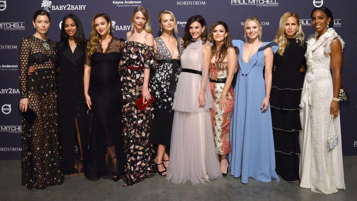 Jessica Biel, from left, Zoe Saldana, Jessica Alba, Jaime King, Baby2Baby co-presidents Kelly Sawyer Patricof and Norah Weinstein, Rachel Bilson, Kristen Bell, Rachel Zoe, and Kelly Rowland at the Baby2Baby Gala presented by Paul Mitchell on Saturday in Culver City.