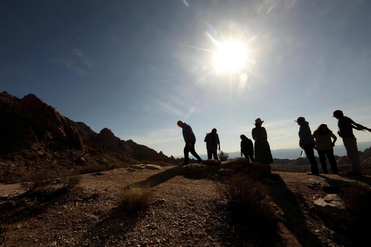 A group at the foot of Avi Kwa Ame, or Spirit Mountain, just south of Searchlight, Nev.