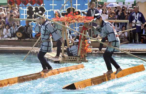 Raftsmen on Floating Wood Blocks