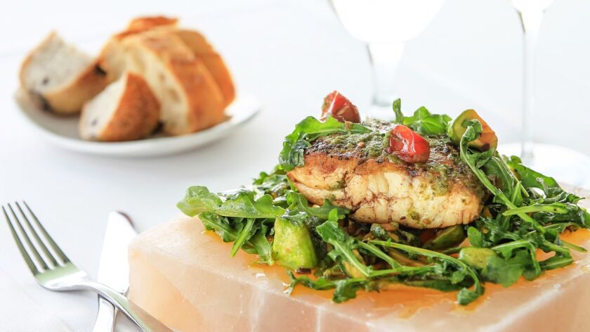 Chef Jeremy Loomis' Fennel-Crusted White Sea Bass With Sautéed Squash and Oregano Chimichurri.