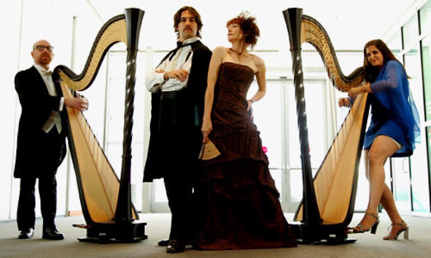 THE ACT: From left, singer Adam Dugas, harpist Alexander Rannie, singer Ann Magnuson and harpist Mia Theodoratus are the quartet in a part-serious, part-satirical Dueling Harps.