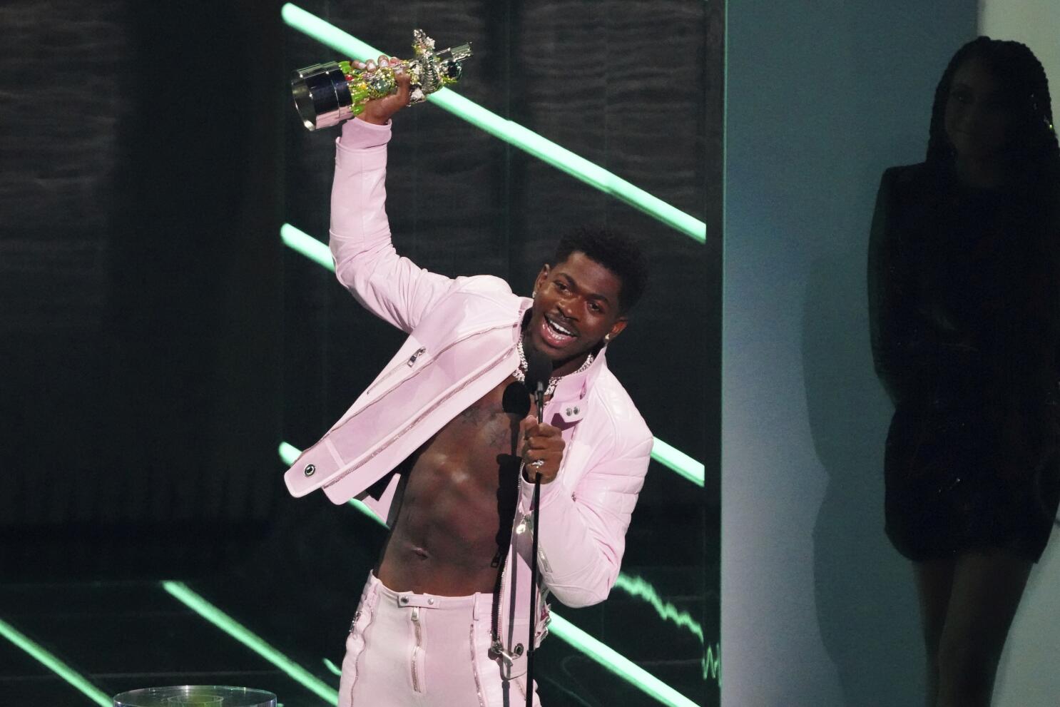 Lil Nas X kisses dancer in fiery BET Awards performance