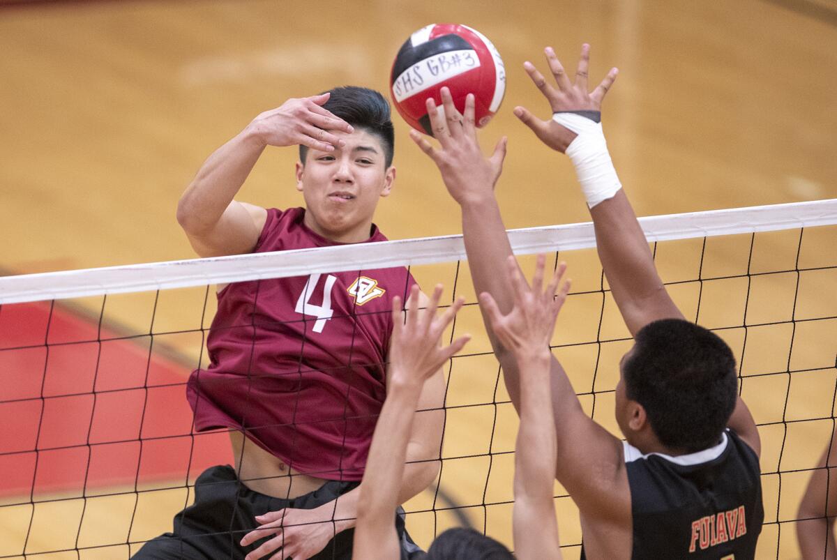 Ocean View High's Devon Vu (4), pictured hitting into Segerstrom's Iverson Fuiava on April 9, and the Seahawks lost in three sets at Pacifica Christian Santa Monica in the semifinals of the CIF Southern Section Division 5 playoffs Wednesday.