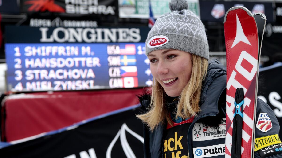 Mikaela Shiffrin is all smiles after winning a women's World Cup slalom race on Nov. 29 in Aspen, Colo. A knee injury could keep her out of action on this year's World Cup circuit until early March.