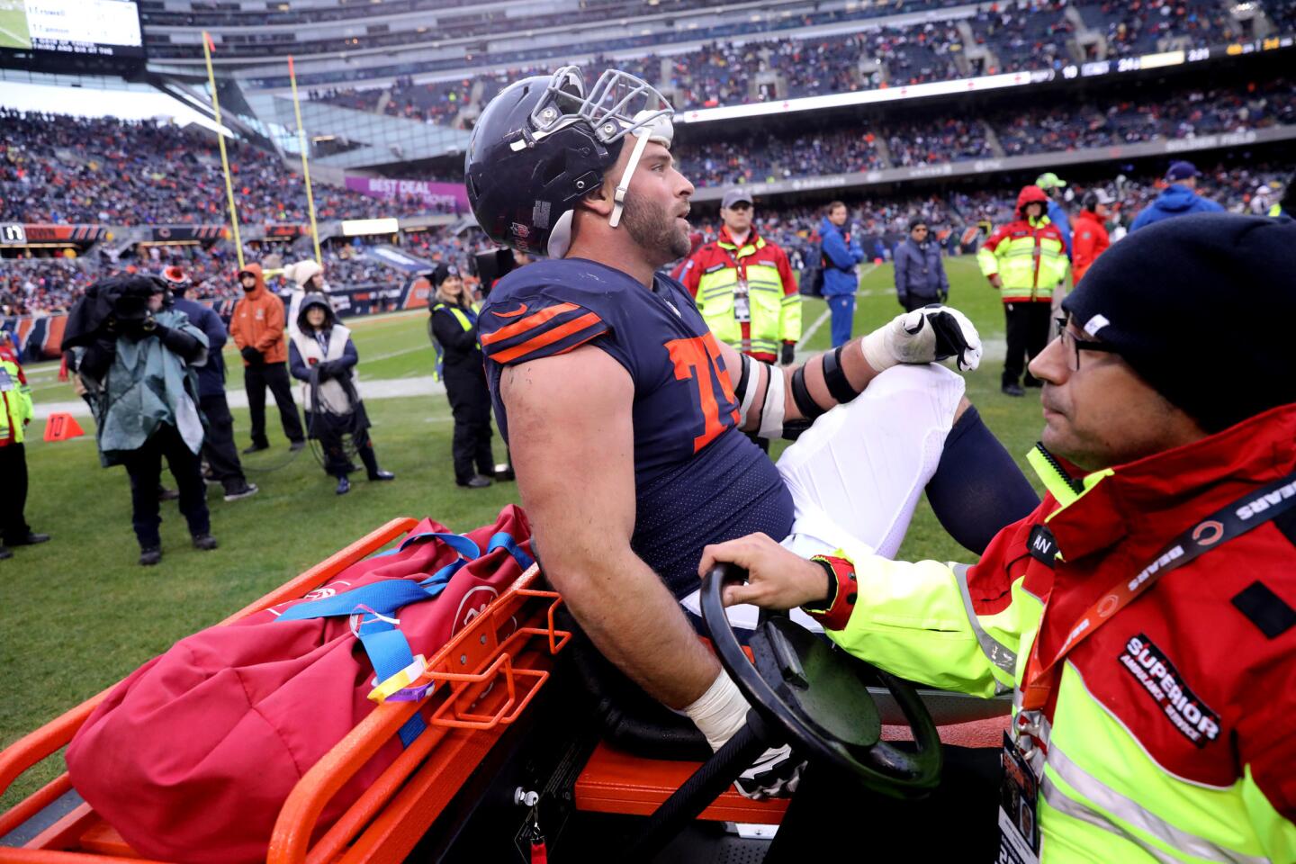 Bears offensive guard Kyle Long is carted off the field after suffering an injury in the fourth quarter against the Jets at Soldier Field on Sunday, Oct. 28, 2018.