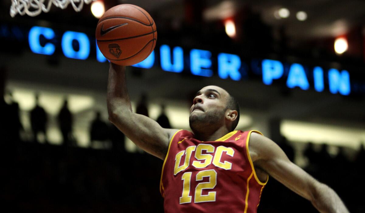USC guard Julian Jacobs goes up for a dunk during a 66-54 victory over New Mexico earlier this season.