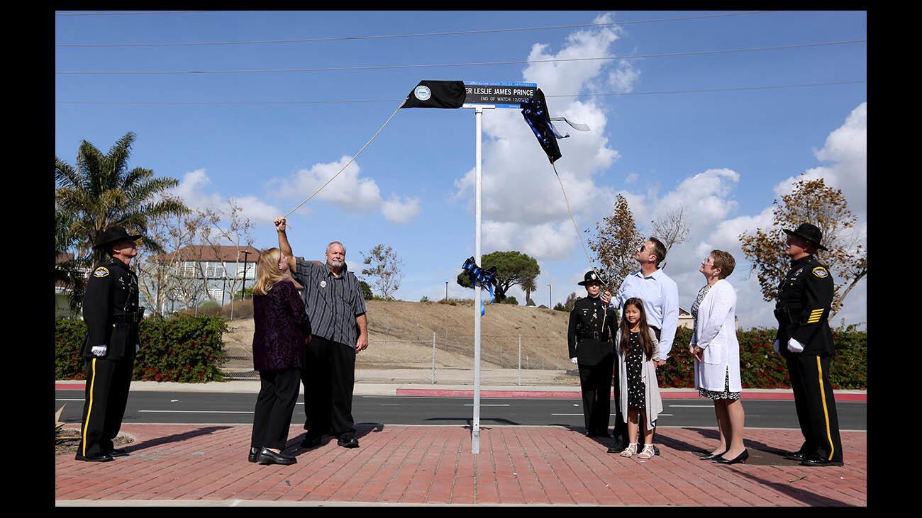 Photo Gallery: Street sign honoring fallen officer Leslie James Prince unveiled on Adams Ave.
