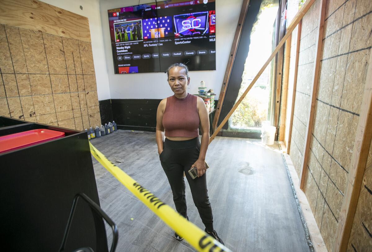 Laura Kearse inside Bred's Nashville Hot Chicken on Oct. 10, two days after a truck crashed into her Costa Mesa restaurant.