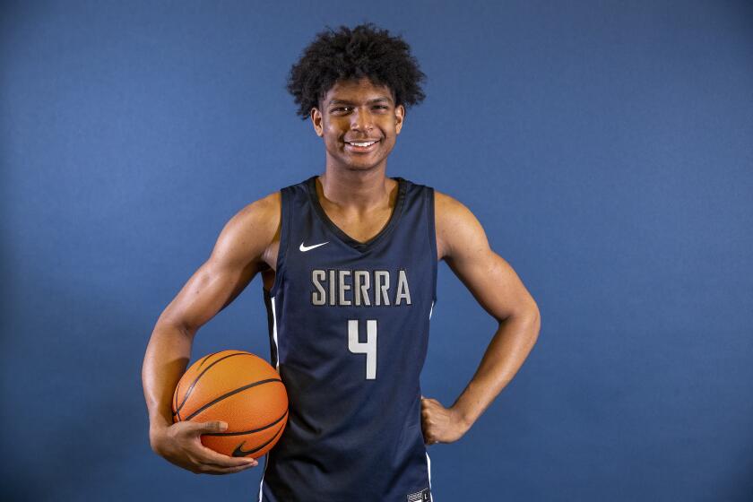 CHATSWORTH, CA - OCTOBER 27, 2021: Isaiah Elohim, a member of the Sierra High School boys basketball team, is photographed during media day inside the school's gymnasium. (Mel Melcon / Los Angeles Times)