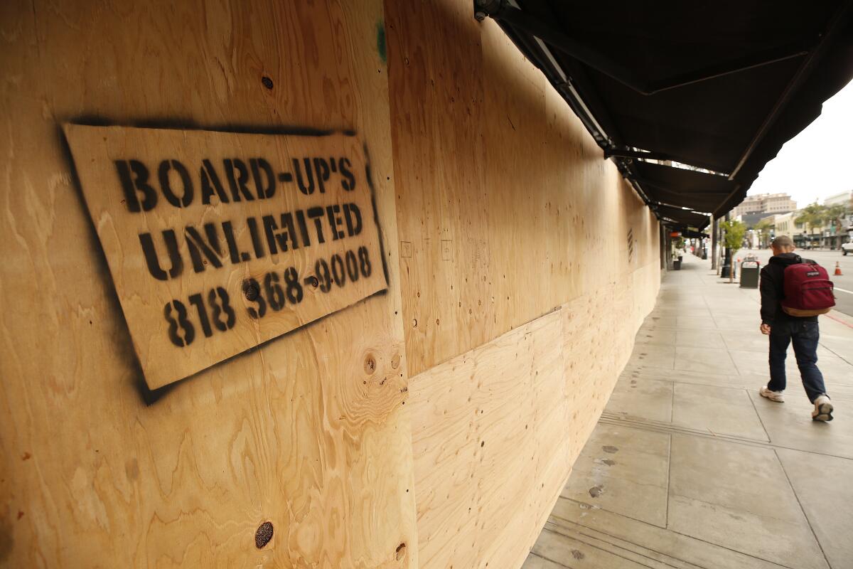 Some stores in Beverly Hills and Pasadena have boarded up the front to prevent vandalism.